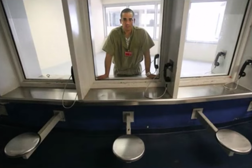 prison visit through glass